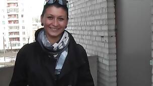 Bewitching brunette sucking a dick in the public toilet