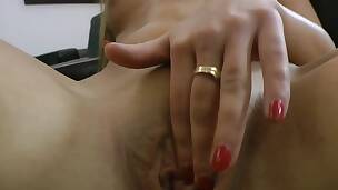 Gorgeous blond sweetheart is rubbing her muff and sucking a giant sex toy